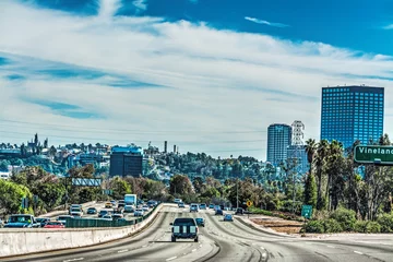 Tuinposter Clouds over Los Angeles 101 freeway © Gabriele Maltinti