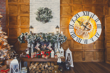 Cozy christmas interior with decorated fireplace