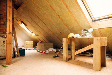 house attic under construction mansard wall insulation