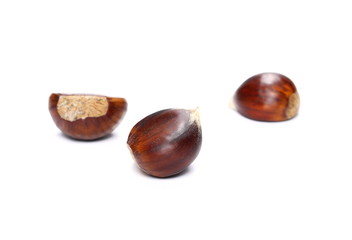 Pile edible chestnut isolated on white background