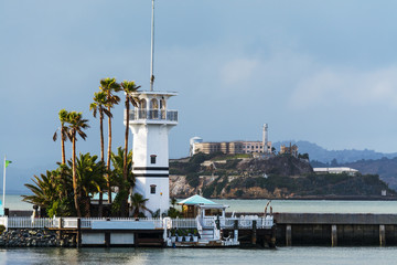 Lighthouse with Alcatraz island on the background in San Francisco