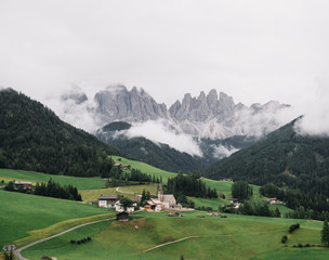 Daytime view of Santa Maddalena town in Dolomite mountains, Italy