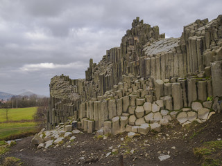 basalt pillars lava vulcanic rock formation organ shape with lake panska skala in kamenicky senov prachen czech republic