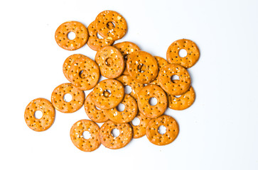 Round salty pretzels isolated on white