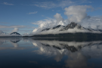 Obraz premium Reflection of mountain in water, Furry Creek, British Columbia, Canada