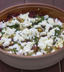 Served with tomato sauce and feta cheese