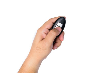 A man's hand Pressing car remote button to open or close the car door lock on white background or isolated