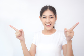 Portrait of Attractive Asian Woman smiling on white background.