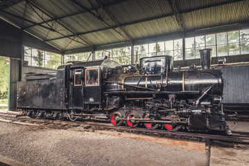 Fototapeta na wymiar Beautiful Old Steam Locomotive Standing in the Depo