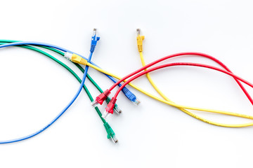 Colored patch-cord on white background top view