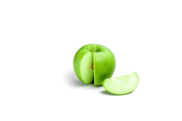 Ripe green apple with leaf and slice isolated on a white background with clipping path