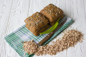 bread with sunflower seeds on a wooden table