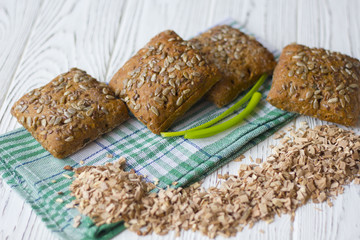 bread with sunflower seeds on a wooden table