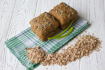 bread with sunflower seeds on a wooden table