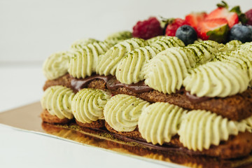beautiful cake with cream and fruits