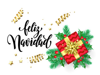 Fototapeta na wymiar Feliz Navidad Spanish Merry Christmas holiday hand drawn calligraphy text for greeting card background design template. Vector gift on Christmas tree holly wreath decoration and golden ribbon confetti