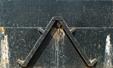 iron triangle on black background