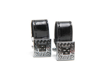black cufflinks isolated