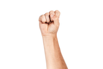 Male hand clenched in fist on white background, isolate.