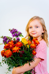 Little girl with flowers