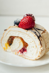 beautiful cake with cream and fruits
