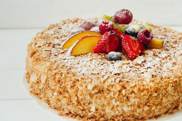 beautiful cake with cream and fruits