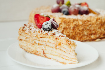 beautiful cake with cream and fruits
