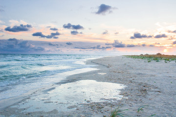 Empty sea coast beach landscape with sunset cloudy sky