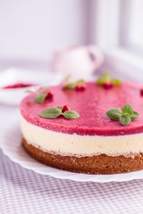 Cake with cream and strawberry jelly