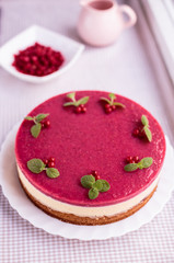 Cake with cream and strawberry jelly