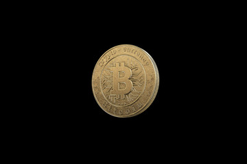 Gold coin Bitcoin on a black background. The concept of crypto currency. blockchain technology.