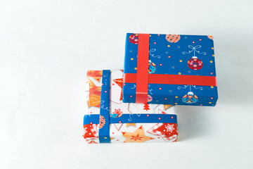 Obraz premium gift white and blue Christmas, New year colored packaged beautifully on a white background