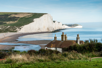 The Coast Guard Cottages & Seven Sisters Chalk Cliffs just outside Eastbourne, Sussex, England, UK