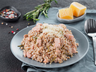 Raw buckwheat risotto with chicken meat and rosemary