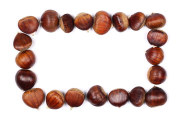 Pile edible chestnut isolated on white background, top view
