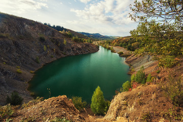 Blue lake in Altai. This is a former copper mine that was flooded with water