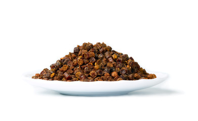 Propolis granules inside plate, bee product