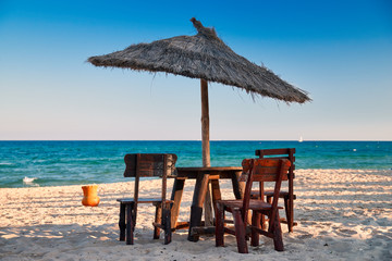 Beach cafe on seashore.