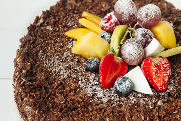 beautiful cake with cream and fruits
