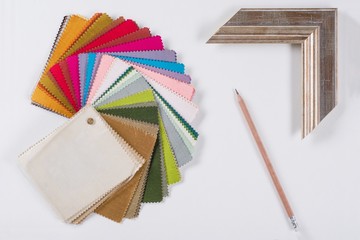 Home renovation. Workplace of the architect, designer with drawings, samples of decorative materials
