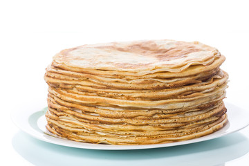 thin delicious pancakes in a plate