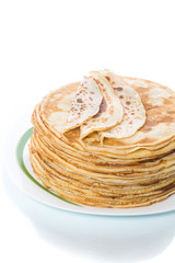 thin delicious pancakes in a plate