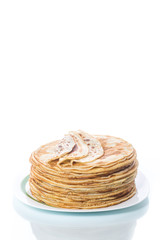 thin delicious pancakes in a plate
