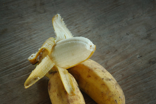 Cultivated banana on wooden floor