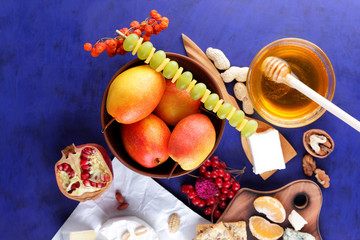 Camembert, blue cheese, fruit and cheese, honey, peanuts, feta, red berries, pomegranate, retro style, vegans breakfast, pop art still life