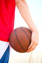 man holding a basketball