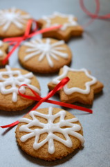 Festive cookies on stone background with red bows