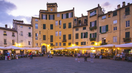 Famous Piazza Anfiteatro in Lucca, Italy - obrazy, fototapety, plakaty