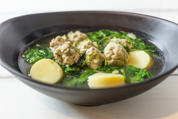 Ivy Gourd soup with pork on wooden background, Thai local food, Tofu Soup