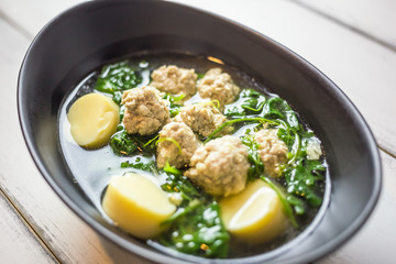 Ivy Gourd soup with pork on wooden background, Thai local food, Tofu Soup